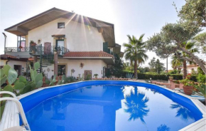 Nice home in Mascalucia with Outdoor swimming pool, WiFi and 3 Bedrooms